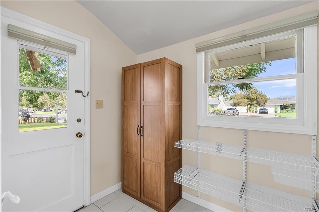 Fantastic walk-in pantry with tile flooring could be turned into a laundry room since the plumbing to the 3/4 bathroom is adjacent. There are also 3 original pocket doors in the home, one to this room from the kitchen.