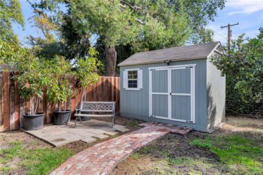 Shed for yard tools or extra storage.