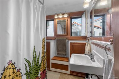 Bathroom with shower in tub.