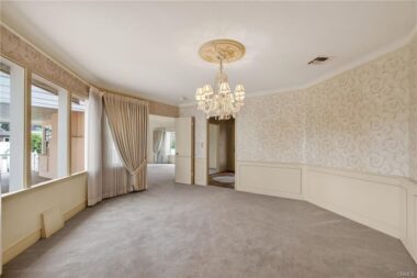Formal dining room with two corner hutches - original photo