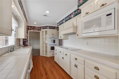 Remodeled kitchen with view into the formal dining room