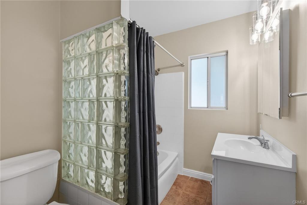 Glass block in the bathroom, with newer vanity