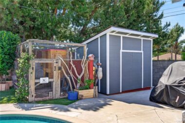 Custom chicken coop and large custom shed for tools, holiday decorations, and bikes -- you name it and it will likely fit!