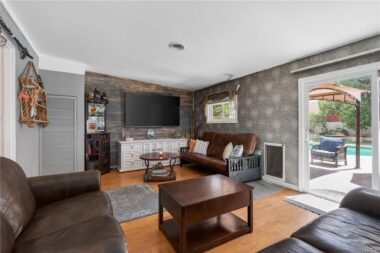 Familiy room overlooking the lovely backyard, with a convenient large doggy door for big pooches!