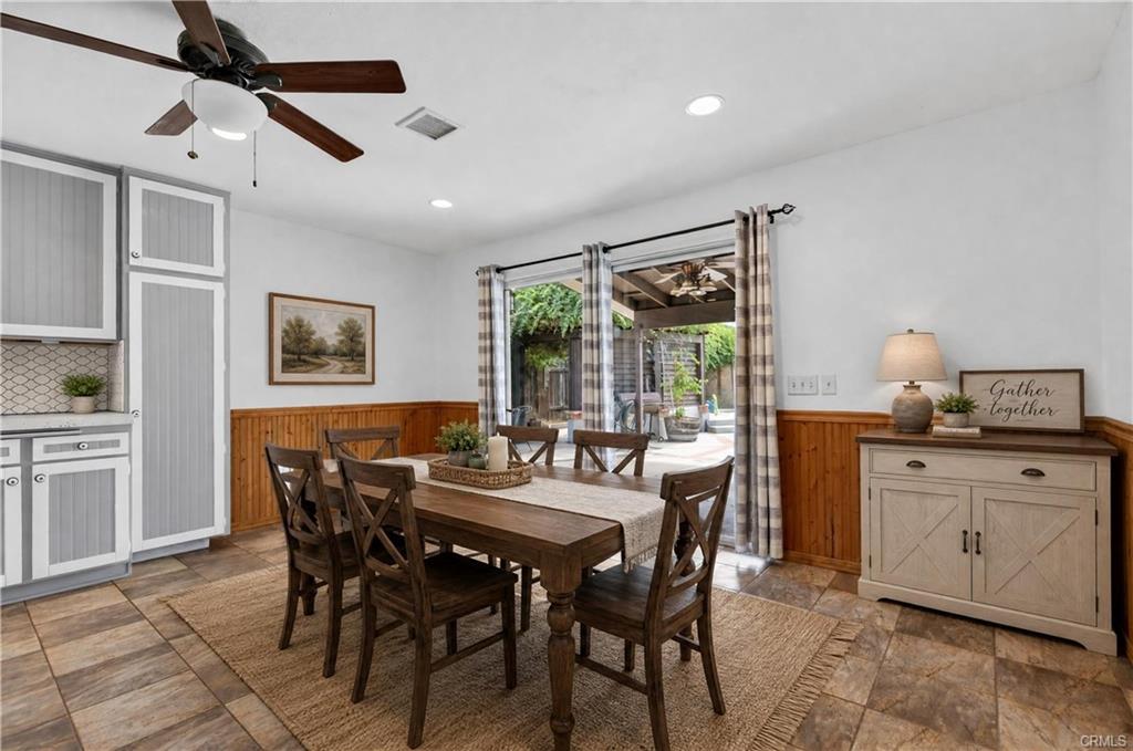 Informal dining area -- virtually staged.