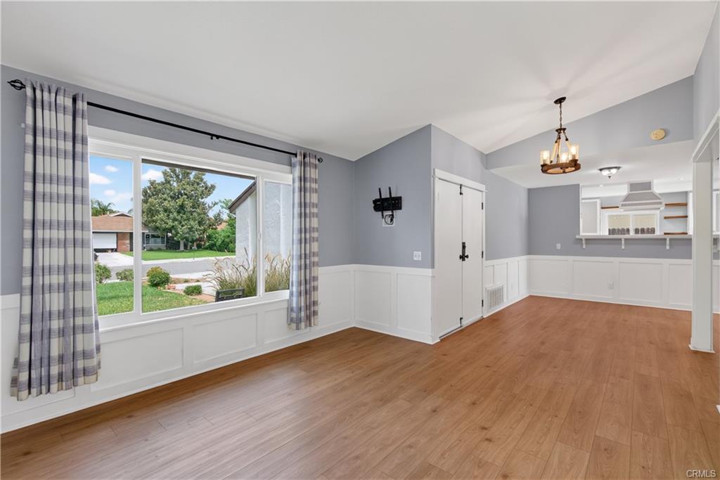 Double door entry with view into the formal dining area which abuts to the kitchen.