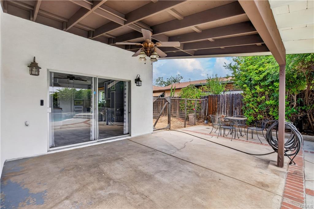 Permitted covered patio with ceiling fan - original photo