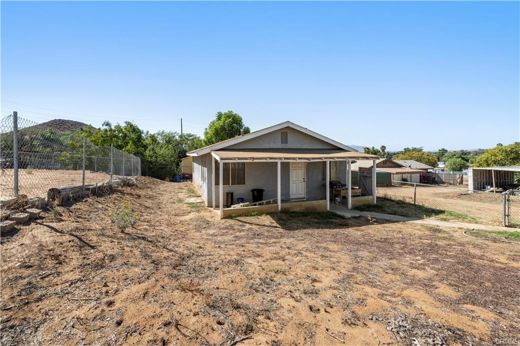 PERMITTED ADU: This structure was built in 1991 and stands alone and privately, complete with its own bedroom, living room, bathroom, and kitchenette -- at approximately 750 sq ft.