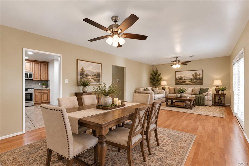 Virtually staged dining room and living room