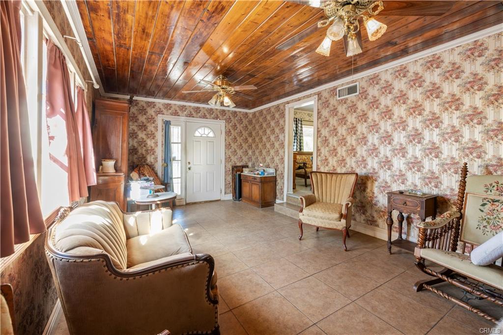 MAIN HOUSE: View of front door from far end of living room
